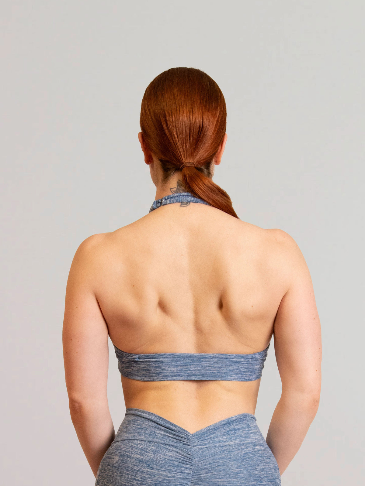Brassière de sport push up bleu de dos