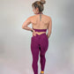 Emsemble de sport sculptine violet de dos 