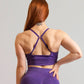 Brassière de sport violet de dos