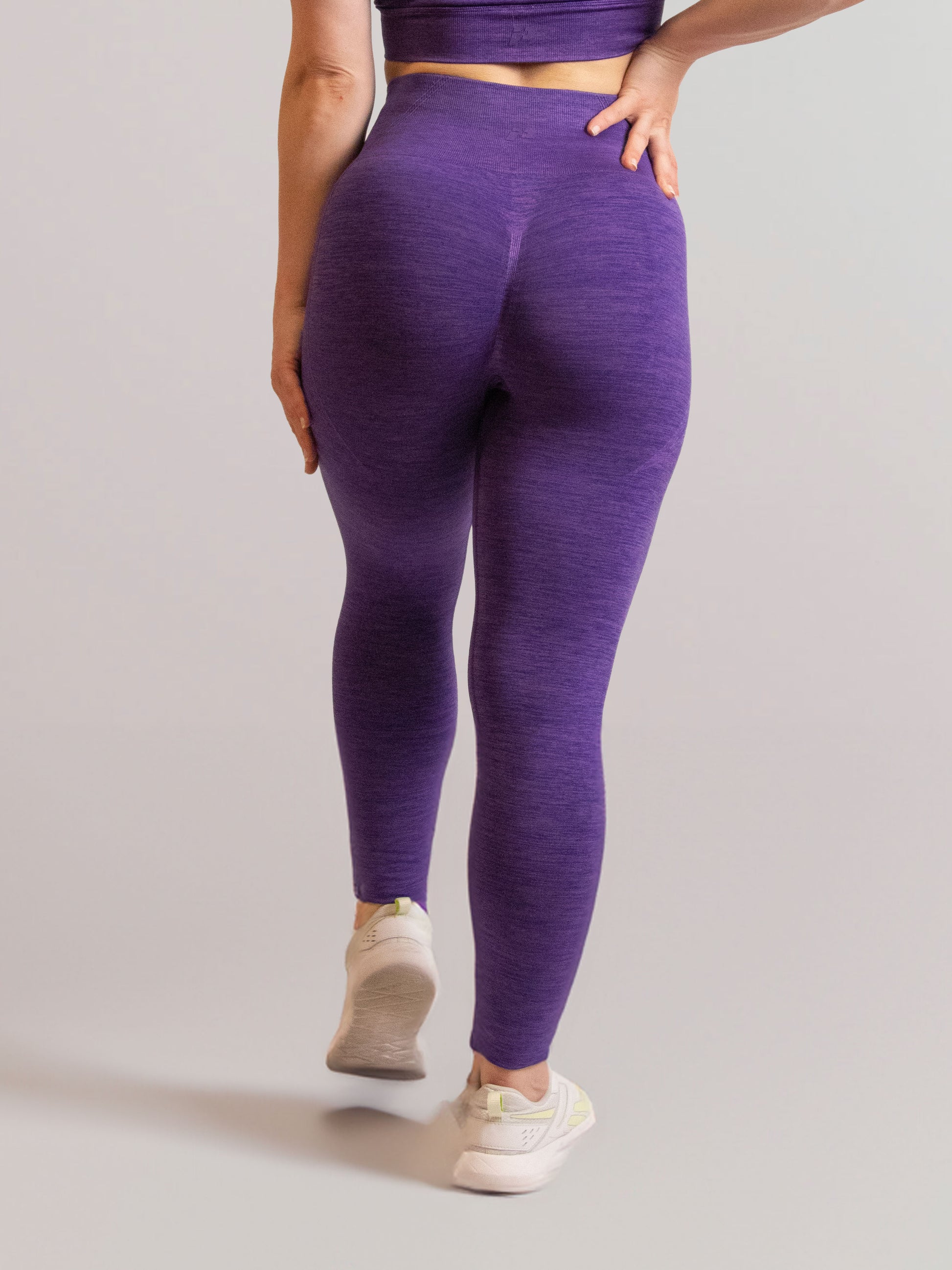 Legging de sport violet de dos