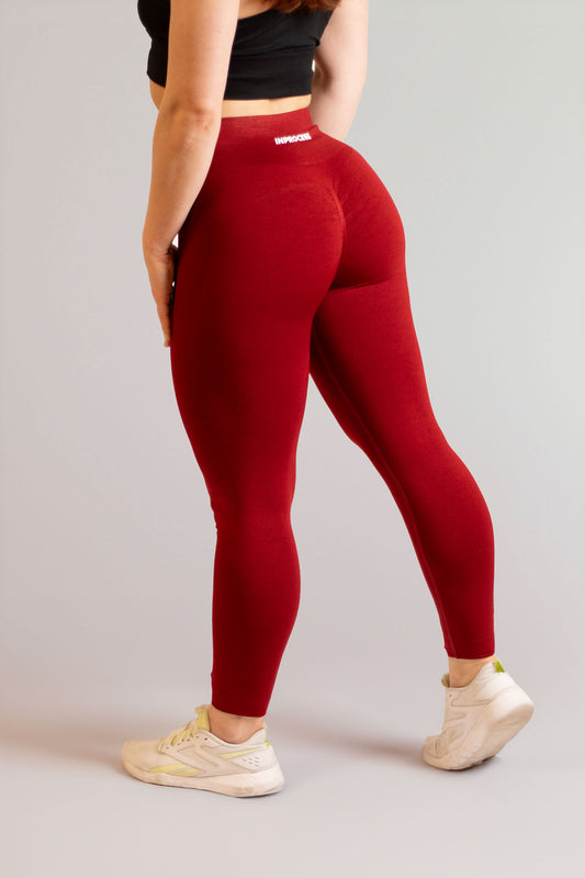 Mannequin de dos portant le legging rouge bordeaux de chez inprocess