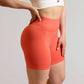 Short de sport couleur peche de 3/4